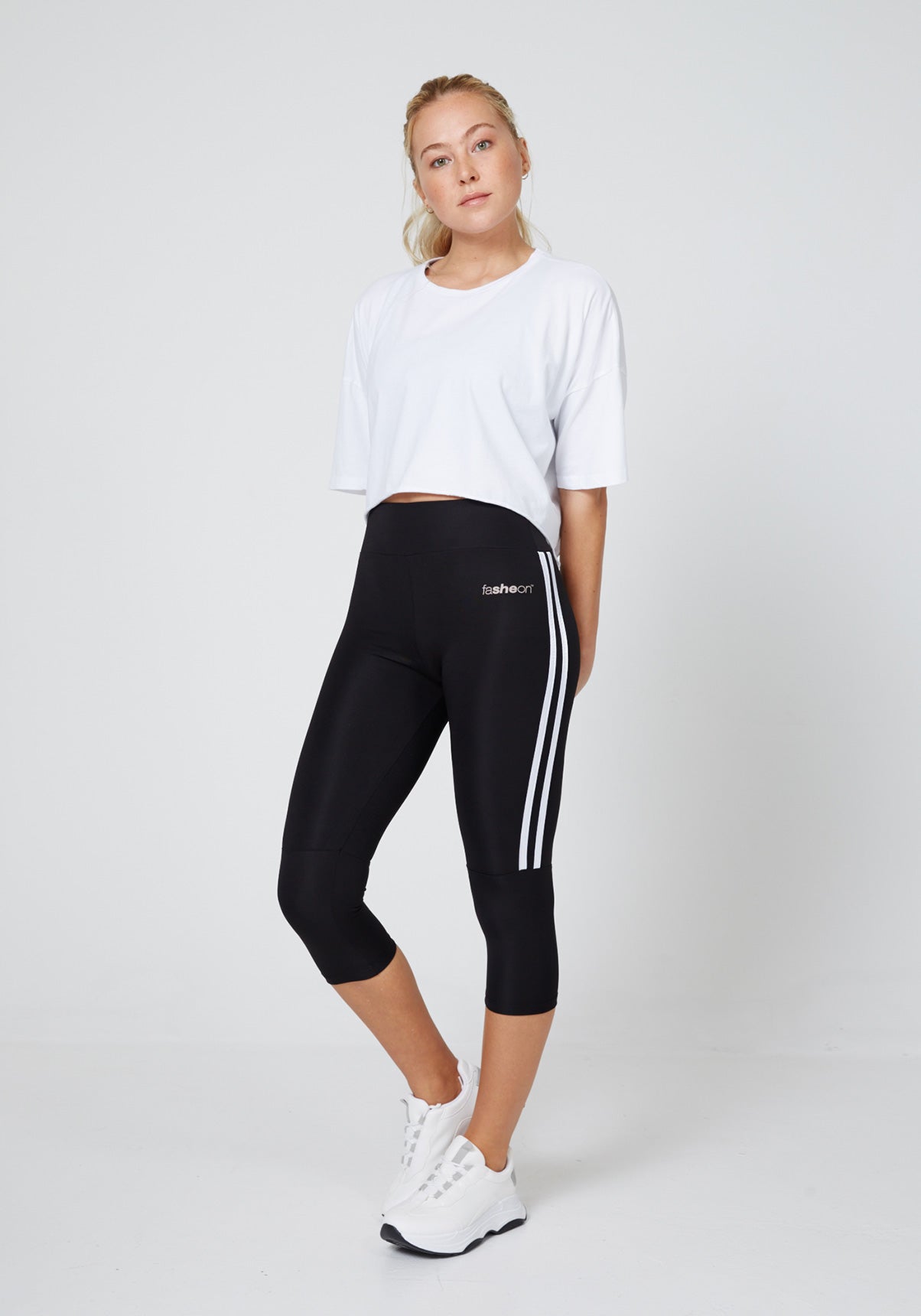 Full Look of Black Side Stripe Cropped Leggings