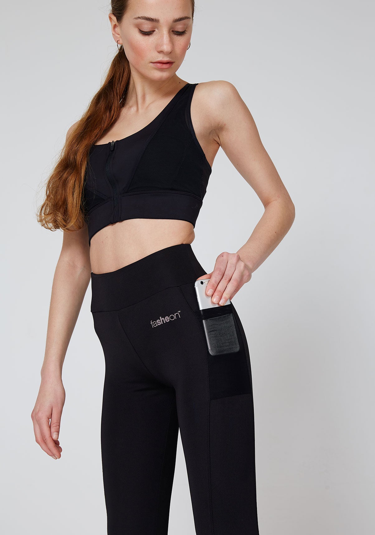 Detail of Black Side Pocket Mesh Bottom Sports Leggings