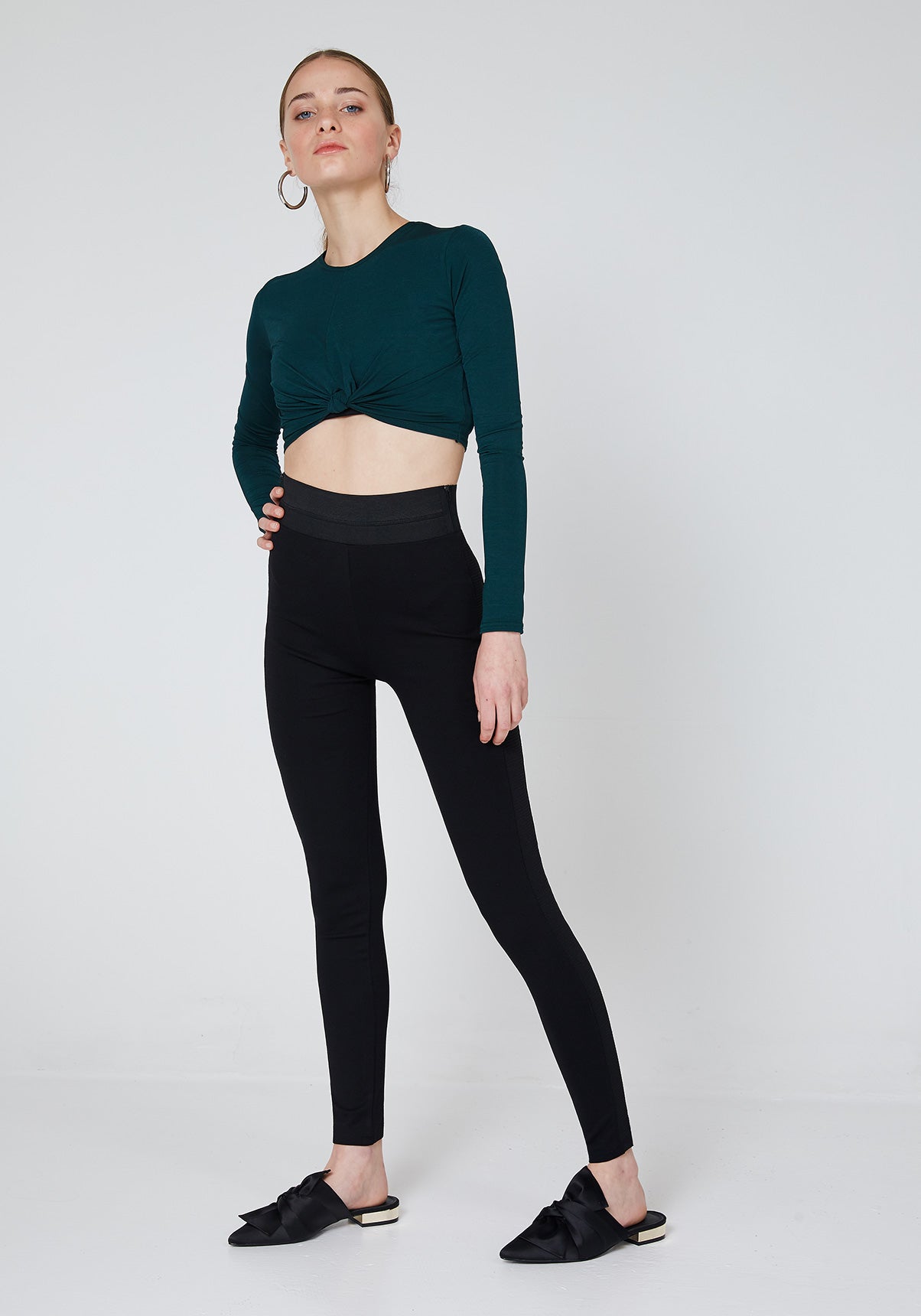 Side Look of Black Waistband Tape Side Leggings