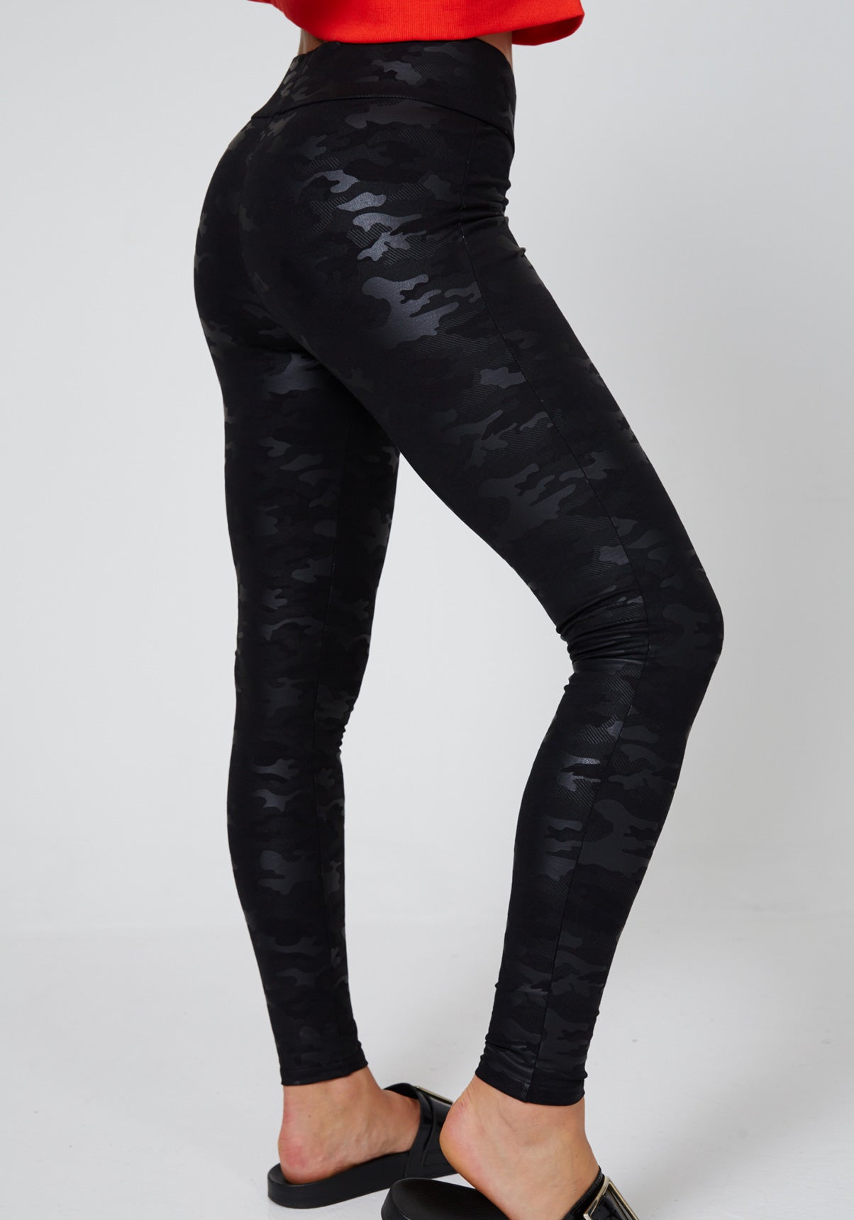 Side Look of Black High Waisted Camo Leggings